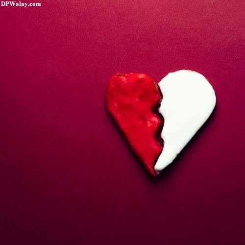 i hate love dp - a heart shaped piece of paper on a red background