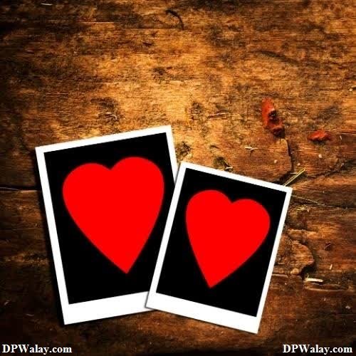 two hearts on a wooden background images by DPwalay
