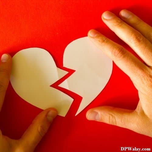i hate love dp - someone cutting out a broken heart