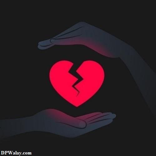 a heart in the hands of someone