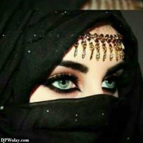 a woman with a black veil and gold jewelry images for girls dp