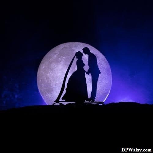 a silhouetted man and woman in front of a full moon instagram love dp images 