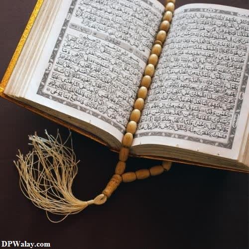 islamic whatsapp dp - a quran with a rosary and a rosary