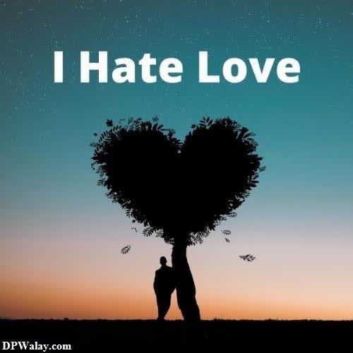 a silhouetted person holding a tree with the words i hate love