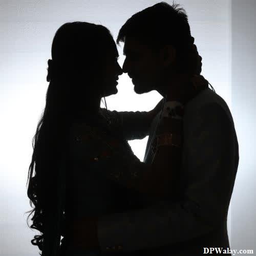 silhouette of a couple kissing love dp instagram 