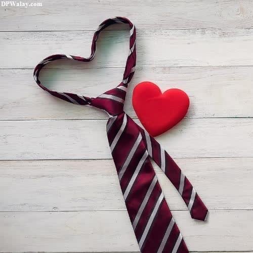 a tie with a heart on it 