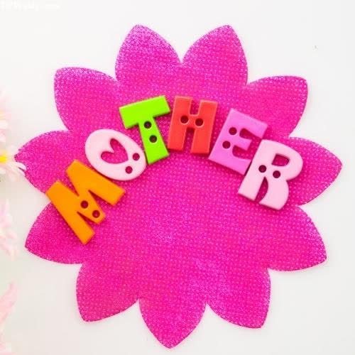 mom dad dp - a flower made out of plastic letters