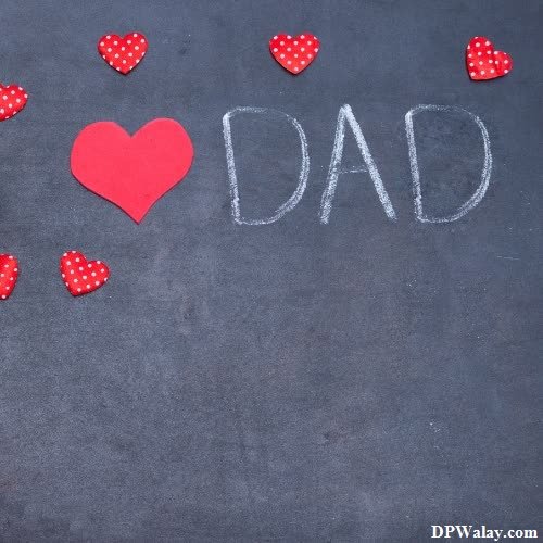 a chalk board with hearts and the words dad written on it 