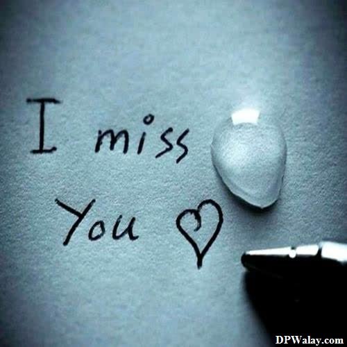 a heart and a pen on a piece of paper with the words i miss you mood off whatsapp dp