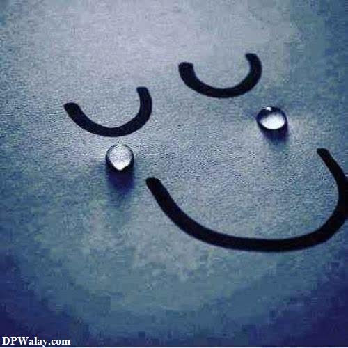 mood off dp - a smiley face with water droplets on it