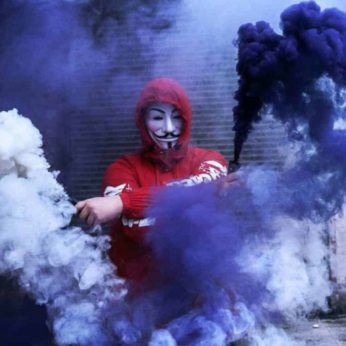 a man in a red hood and mask is smoking smoke new dp 