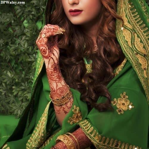 a beautiful woman in a green dress new girl dp pic