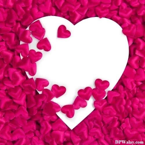 a heart made out of pink petals