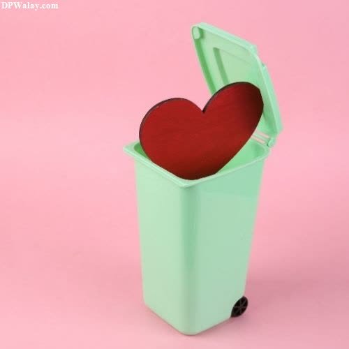 a heart shaped box with a red heart inside sad broken heart dp 