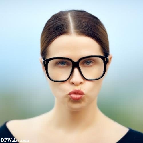a woman with glasses blowing her nose single dp pic