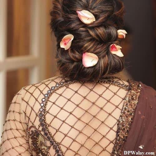 a woman with long hair and flowers in her hair single pic for dp