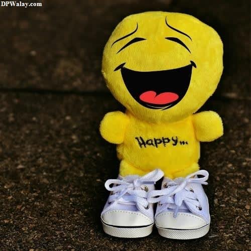 a stuffed yellow teddy bear with a happy expression smile images dp