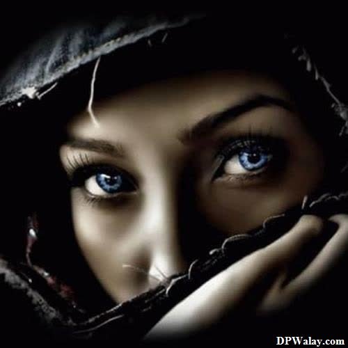 a woman with blue eyes and a hoodie unik dp