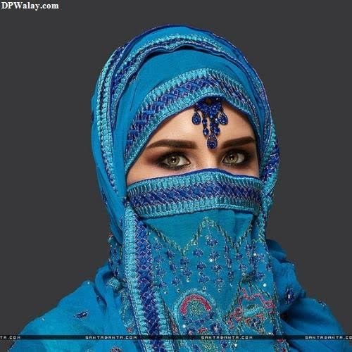 unique dp for whatsapp - a woman wearing a blue head scarf