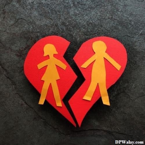 a heart shaped paper cut out of two people very sad dp girl 