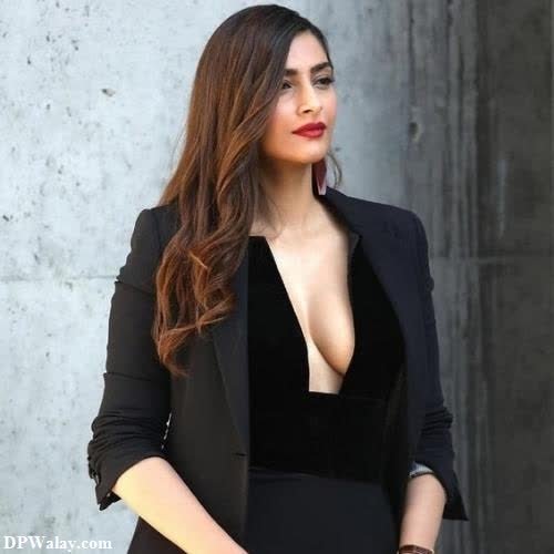 a woman in a black dress and jacket whatsapp dp hot