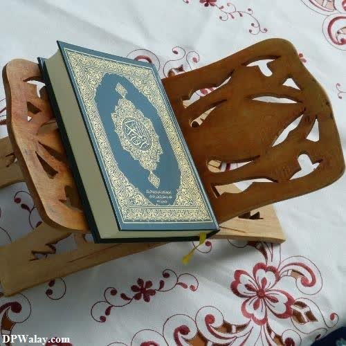 a wooden sler with a book on it