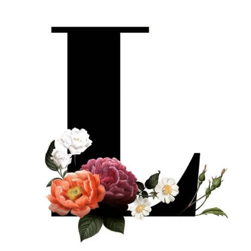 a black letter with flowers on it