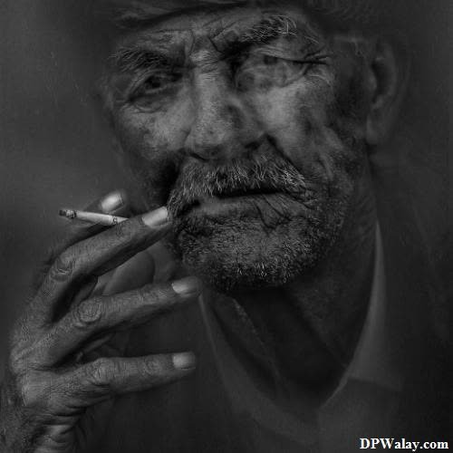 Bad Boy DP - a man with a beard and a hat smoking a cigarette