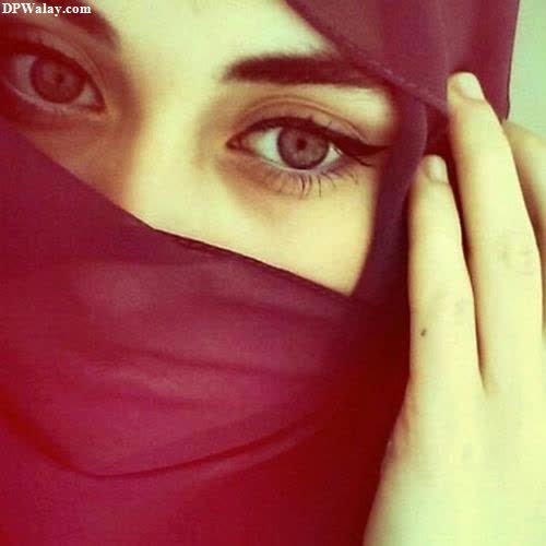 a woman wearing a red hina beautiful hijab girl dp