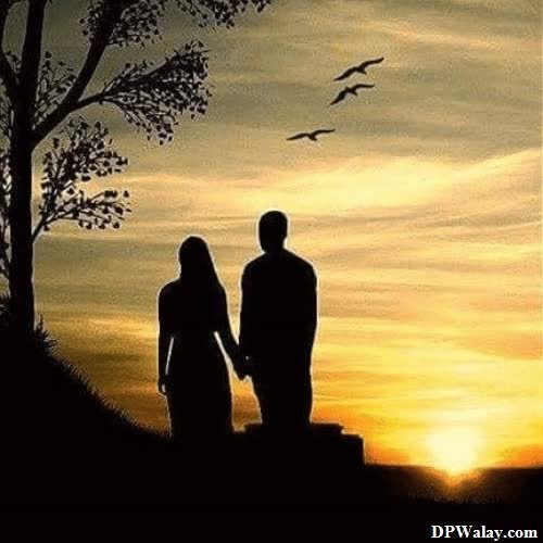 Black DP For WhatsApp - a couple standing in front of a sunset