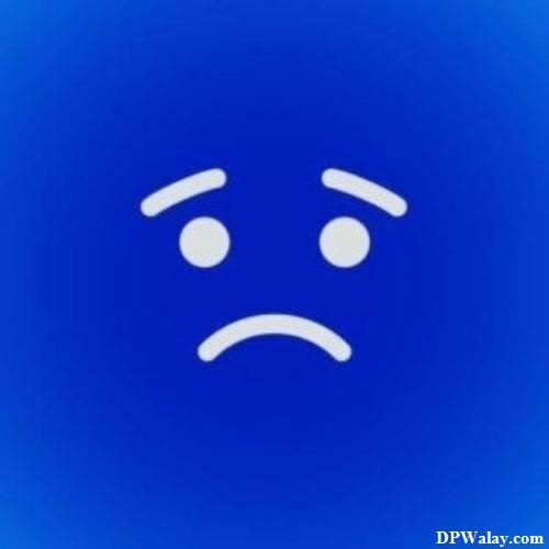 a blue background with a sad face