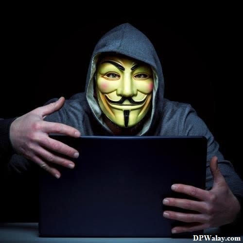 a man in a hoodie holding a tablet computer images by DPwalay