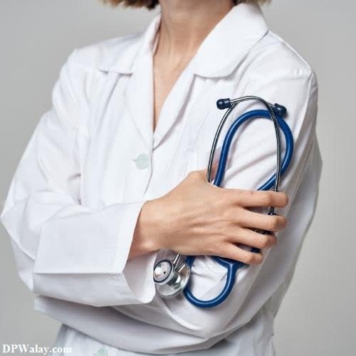 a woman in a white coat holding a stel