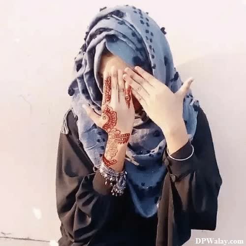 Hijab Girl DP - a woman with a scarf covering her face