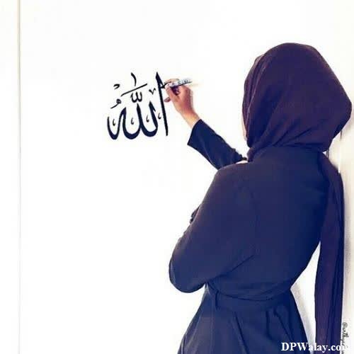 Muslim Girl DP - a woman writing on a whiteboard with a marker