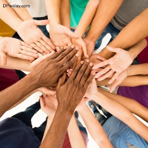 a group of people holding hands together-lJWG dp for whatsapp group of friends