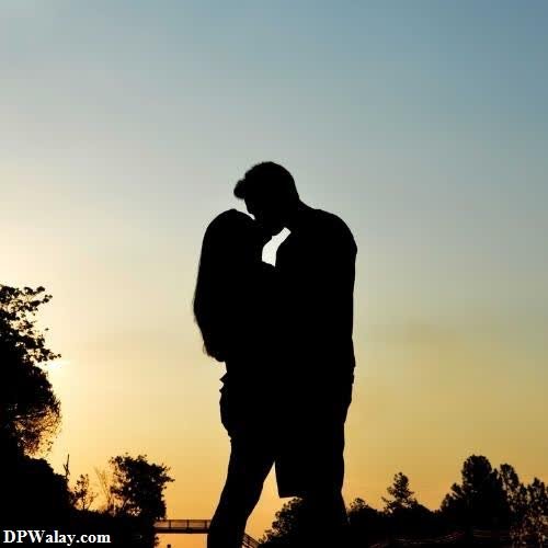 a couple kissing in the sunset-psLL