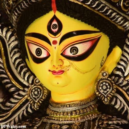 a close up of a statue of deity