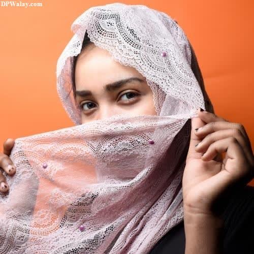 Hijab Girl DP - a woman wearing a white scarf with lace