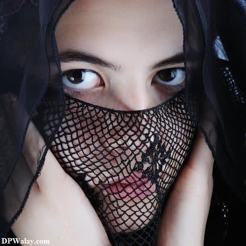 a woman with a veil over her face girl hijab dp 