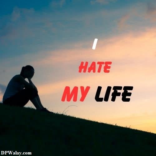 a man sitting on top of a hill with the words hate my life 