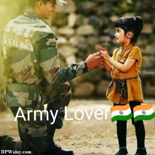 a soldier giving a child a gift images by DPwalay