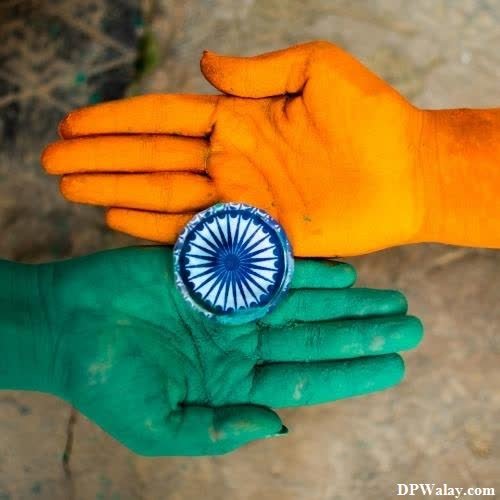 two hands holding a ring with the indian flag on it