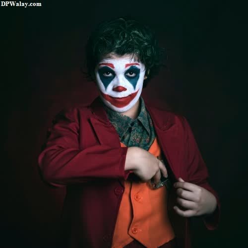 a young boy dressed as the joker images by DPwalay