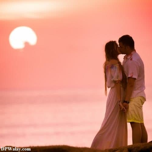 Modern Cute Couple DP - a couple kissing on the beach at sunset-BKSN