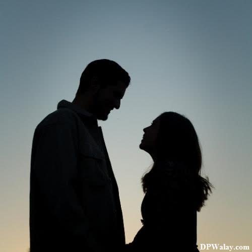 a silhouette of a couple at sunset pinterest couple dp