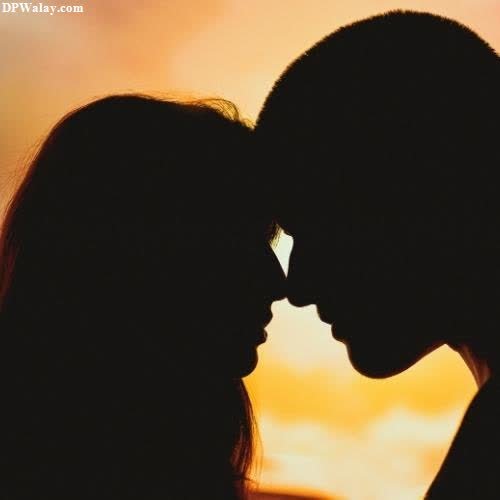 silhouette of a couple kissing at sunset romantic couple dp