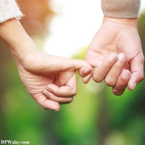 Romantic DP - a couple holding hands with the text, ` ` '-6yk3