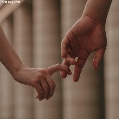 a couple holding hands romantic dp