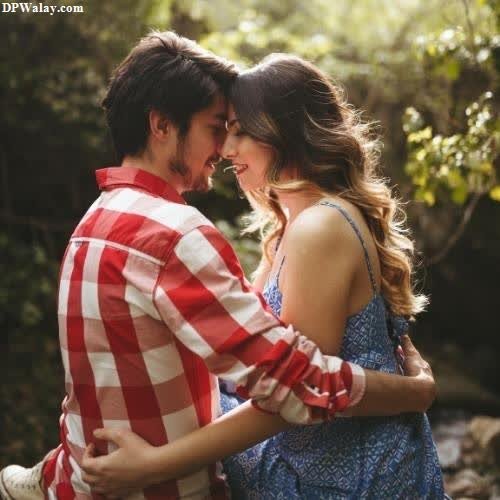 a couple hugging in the woods images by DPwalay